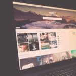 Laptop screen showing Pexels website, ideal for stock photo needs.